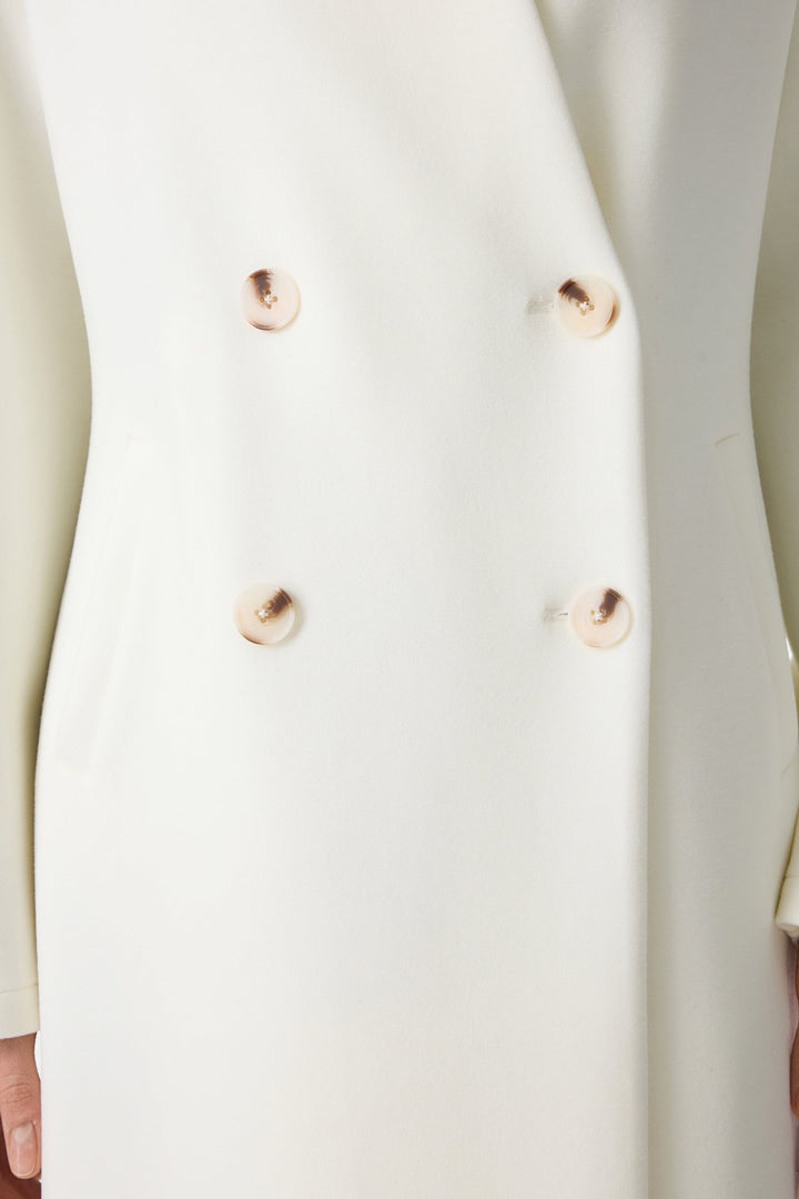 Double-breasted coat with standing collar