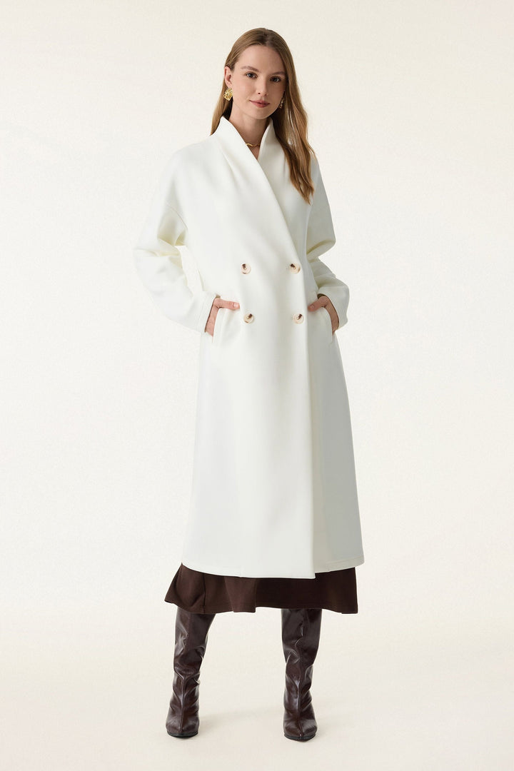 Double-breasted coat with standing collar