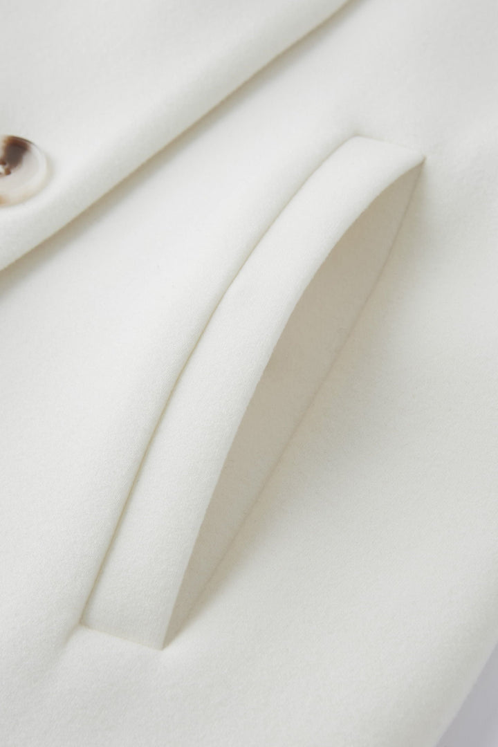 Double-breasted coat with standing collar