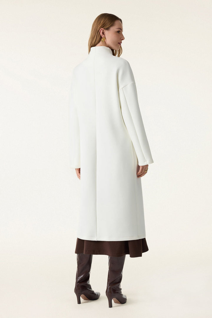 Double-breasted coat with standing collar