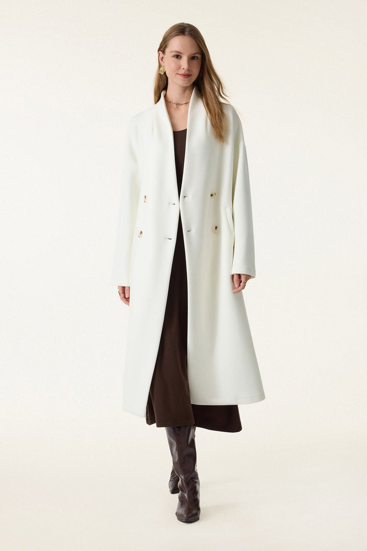 Double-breasted coat with standing collar