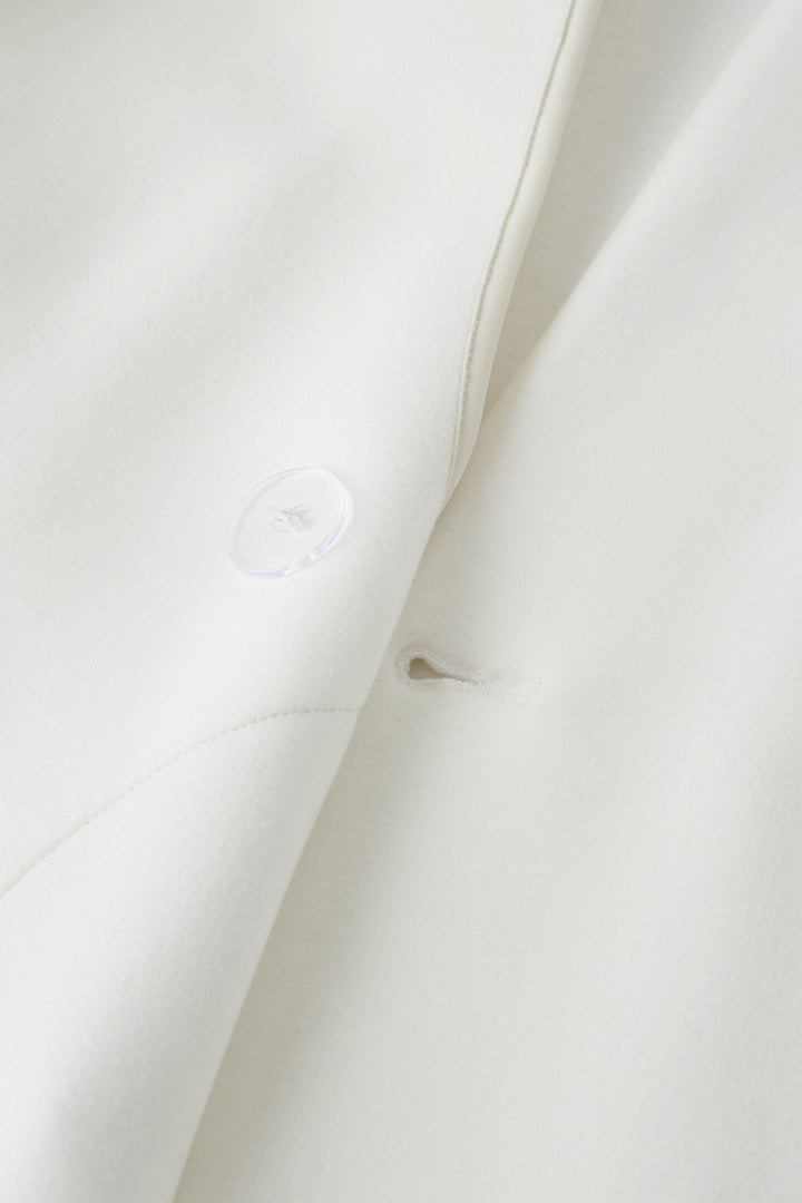 Double-breasted coat with standing collar