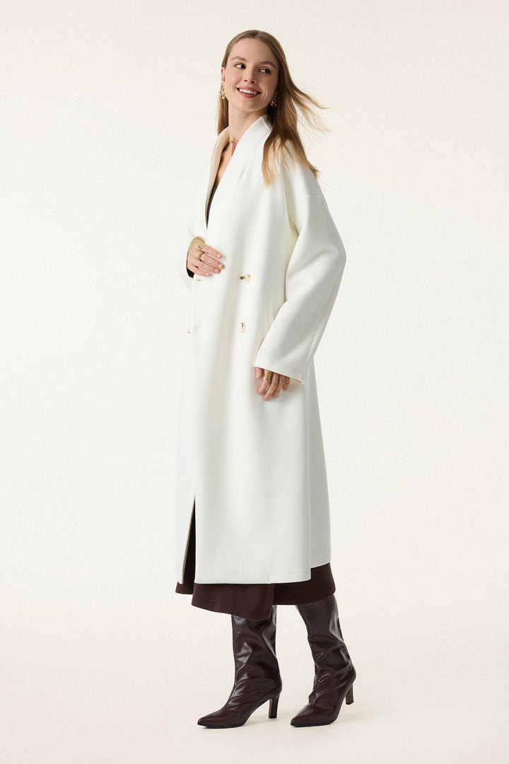 Double-breasted coat with standing collar
